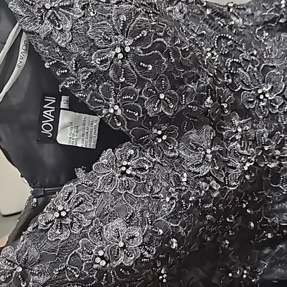 Javoni 62380 Lace off the shoulder peplum mermaid gown - Picture 7 of 11